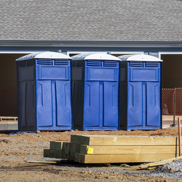 what is the cost difference between standard and deluxe portable restroom rentals in Lind WA